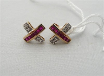 Lot 174 - A pair of ruby and diamond cross earrings