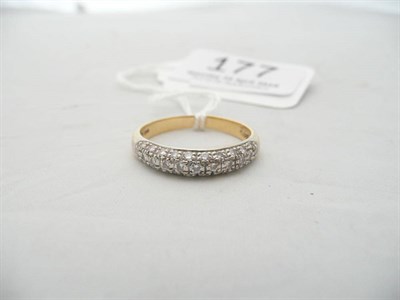 Lot 177 - A diamond gold ring set with small stones