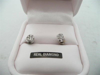 Lot 179 - A pair of diamond set stud earrings