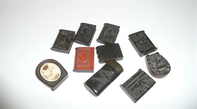 Lot 184 - A collection of ten Vulcumite/Ebonite vesta cases