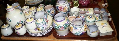 Lot 195 - Two trays of assorted Poole pottery including bowls, jugs, preserve jars and covers, etc