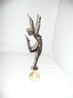 Lot 209 - Art Deco style bronze figure on an onyx base