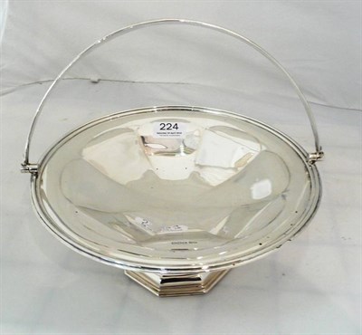 Lot 224 - Silver basket with hinged swing handle, Sheffield assay