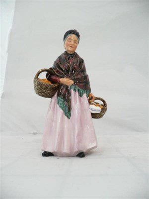 Lot 247 - Doulton figure "Orange Lady"