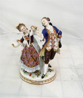 Lot 249 - A German porcelain figure group of a dancing couple