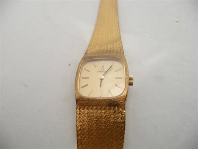 Lot 278 - An Omega wristwatch with integral mesh bracelet stamped "375"