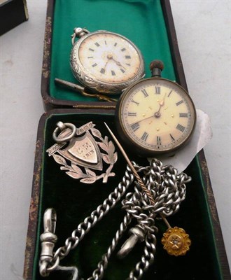 Lot 287 - Silver lady's watch and chain, silver shield, steel lady's watch and a stock pin