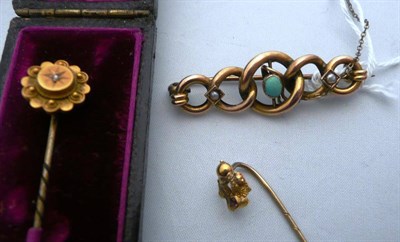 Lot 291 - A diamond set pin, cased, an amethyst set pin, a turquoise and seed pearl bar brooch