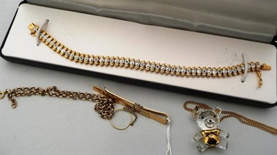 Lot 294 - A three colour tie slide, a belcher chain and a diamond set bracelet and a Swarovski crystal...