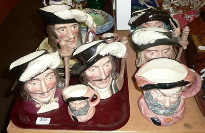 Lot 308 - Eight Royal Doulton character jugs and five pottery plates