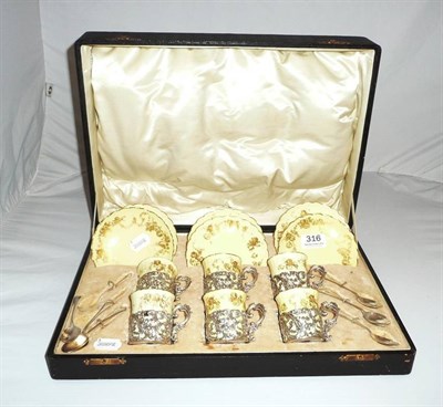 Lot 316 - Royal Worcester silver-mounted coffee set and silver spoons, cased