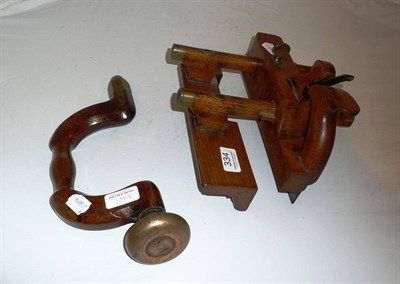 Lot 334 - A wooden brace and plane