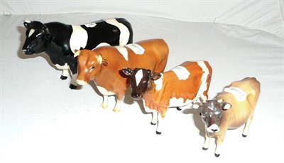 Lot 339 - Beswick Ayrshire cow, Jersey cow, Guernsey bull and a Friesian bull (all a.f.)