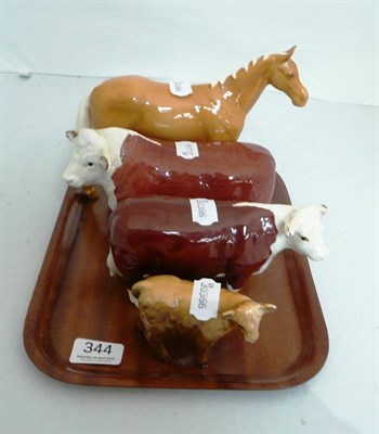 Lot 344 - Beswick Hereford bull and cow, palomino horse and a Highland calf