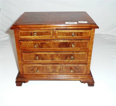 Lot 436 - Inlaid walnut miniature chest