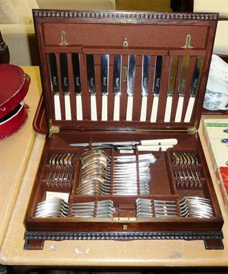 Lot 447 - An oak canteen of silver plated flatware