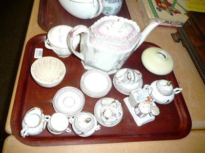 Lot 460 - A Newhall teapot and cover and a doll's tea service, creamware sucrier and associated cover, a...