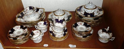 Lot 466 - A shelf including Coalport blue and gilt decorated tea service retailed by T Gade and Co