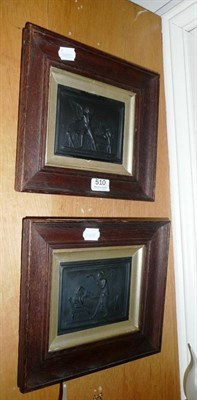 Lot 510 - A pair of late Mayers black basalt plaques in oak frames