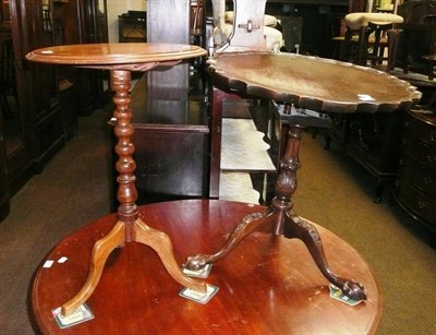 Lot 580 - A George III-style tripod table and 19th century mahogany flip-top table