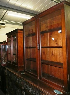 Lot 582 - A glazed side cabinet and a small mahogany book case