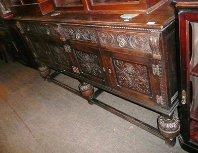 Lot 583 - Carved oak sideboard