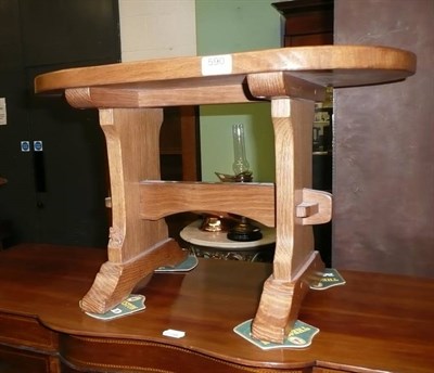 Lot 590 - An oak 'Foxman' coffee table with oval top