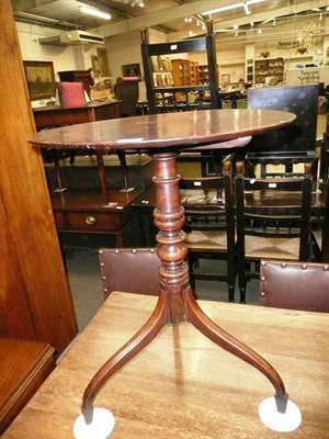 Lot 593 - A mahogany wine table