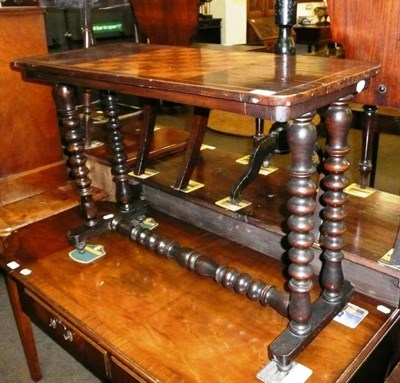 Lot 604 - A Victorian chessboard inlaid side table