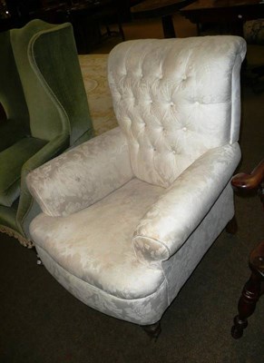 Lot 634 - A Victorian button back armchair