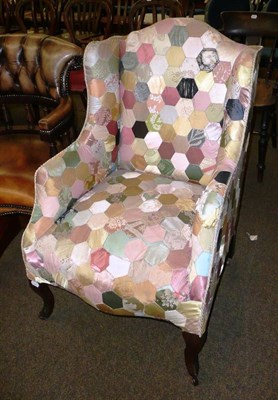 Lot 644 - Small wing back chair with patchwork upholstery