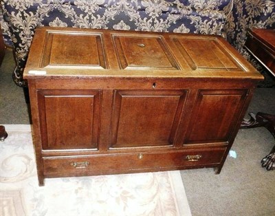 Lot 658 - A joined oak box with hinged lid and fielded panel front