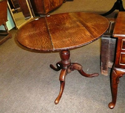 Lot 660 - Georgian oak pedestal table