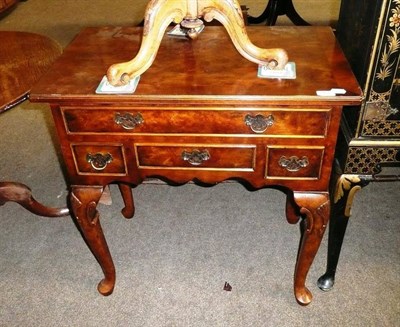 Lot 661 - 18th century-style walnut lowboy