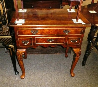 Lot 662 - 18th century-style walnut lowboy