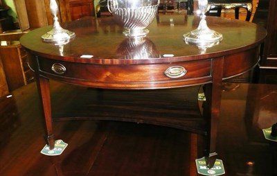 Lot 673 - A mahogany coffee table