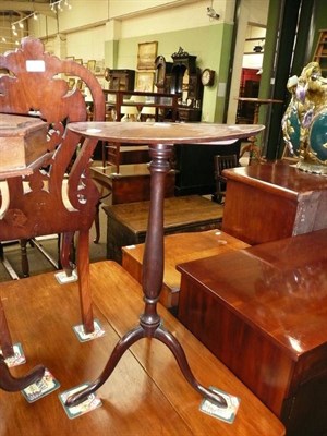 Lot 679 - An American cherrywood tripod table with oval top