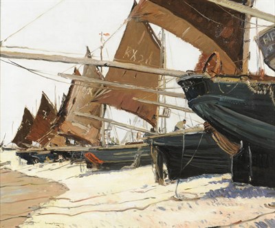 Lot 988 - George Graham R.S.W., R.I., R.O.I.(resigned), R.B.A. (1881-1949) Fishing Boats on a Beach at...