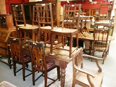 Lot 744 - Four oak lattice-back panel-seated chairs and a ash arm chair and four dinning chairs