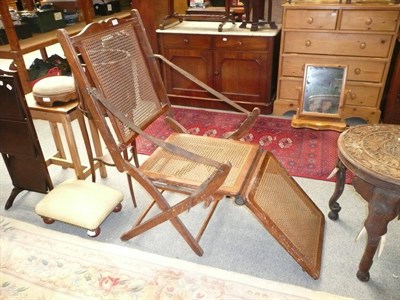 Lot 829 - An early 20th century cane seated folding chair