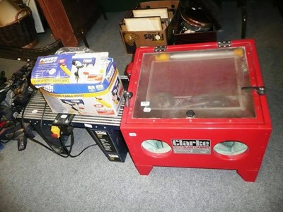 Lot 845 - Clarke shop glass cabinet, Powercraft electric cable hoist and an electric table saw