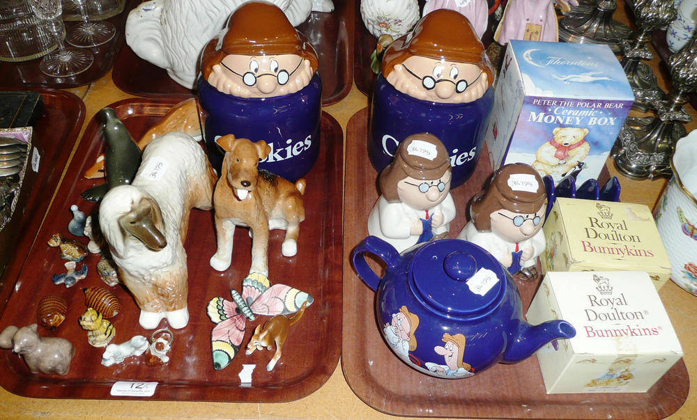 Lot 12 - Two trays of Wade Tetley jars, money boxes, toast rack and teapot, two boxed Royal Doulton...