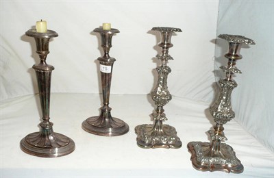 Lot 15 - Two pairs of silver plated candlesticks