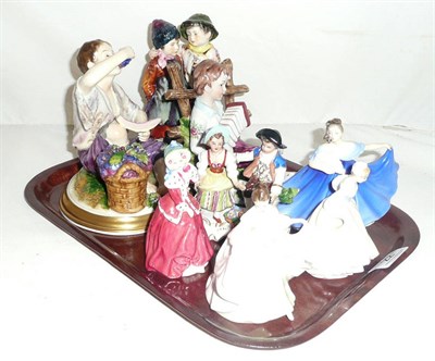 Lot 22 - Two 'Kaiser' figural ceramic groups, four Royal Doulton figures 'Sara', 'Christmas Morn, 'Fair...