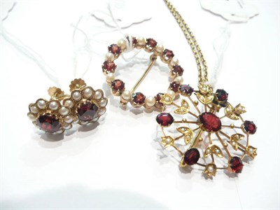 Lot 44 - A garnet and seed pearl brooch/pendant on chain, a 9ct gold garnet and cultured pearl brooch...