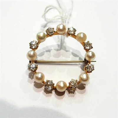 Lot 50 - A cultured pearl and diamond hoop brooch