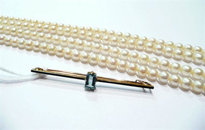 Lot 55 - A double strand of cultured pearls and an aquamarine bar brooch