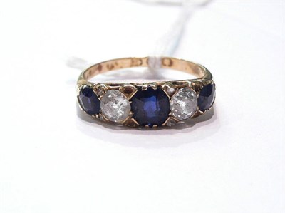 Lot 69 - 18ct gold sapphire and diamond five stone ring with pairs of tiny diamonds - some missing