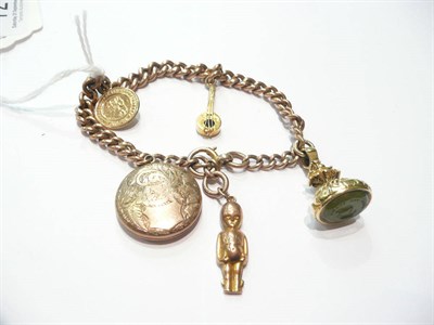 Lot 72 - Rose gold curb bracelet hung with five charms