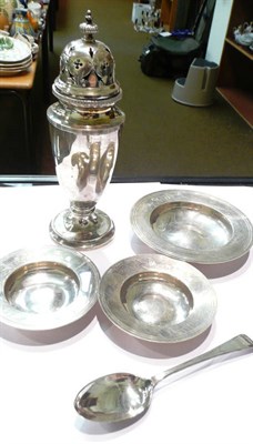 Lot 73 - Silver caster, cased silver spoon and three silver dishes